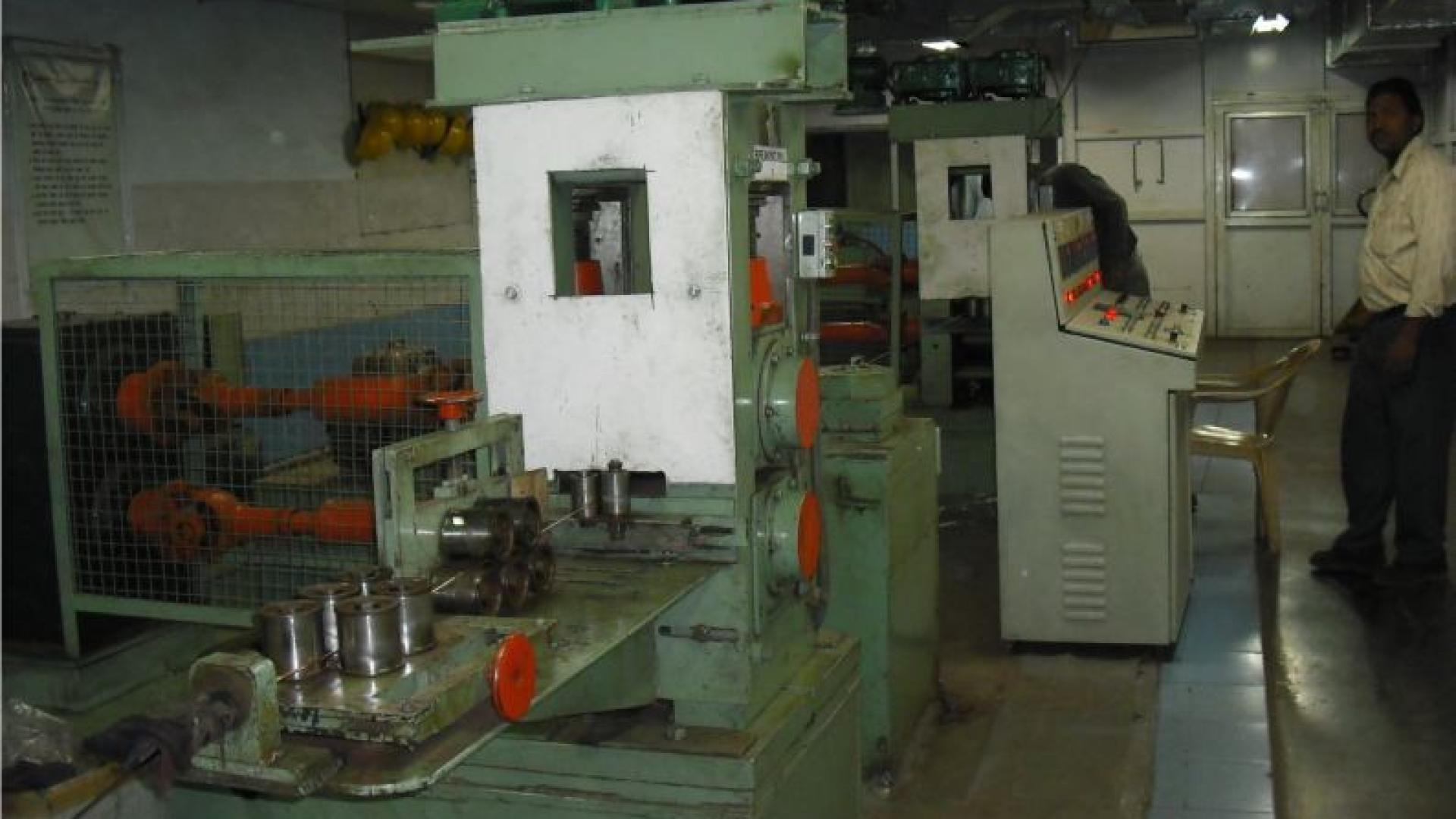 Enclosed Pressured Flattening Mill With Online Laser Dimension Monitoring System